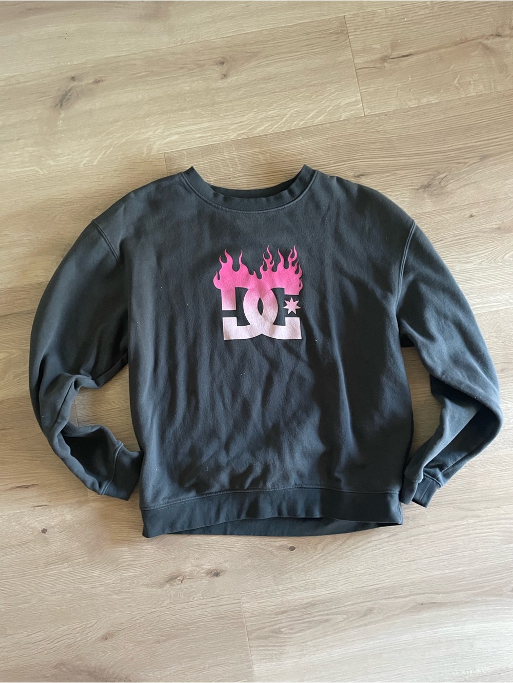 DC Women's Black Crew Sweatshirt with Pink Flame Logo